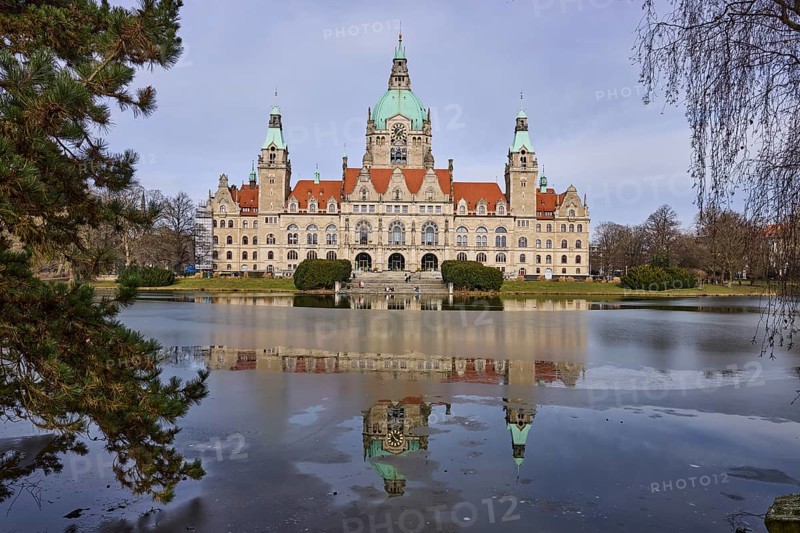 New Town Hall Hanover, architect Hermann Eggert, architectural style Neo-Renaissance, Wilhelminism, ice surface, abstract reflections, pond, mesh pond, park, Maschpark, pines (Pinus), lawn, tree, diffuse light, milky blue cloudy sky, slightly sunny, Hanover, state capital, Hanover region, Lower Saxony, Germany, Europe