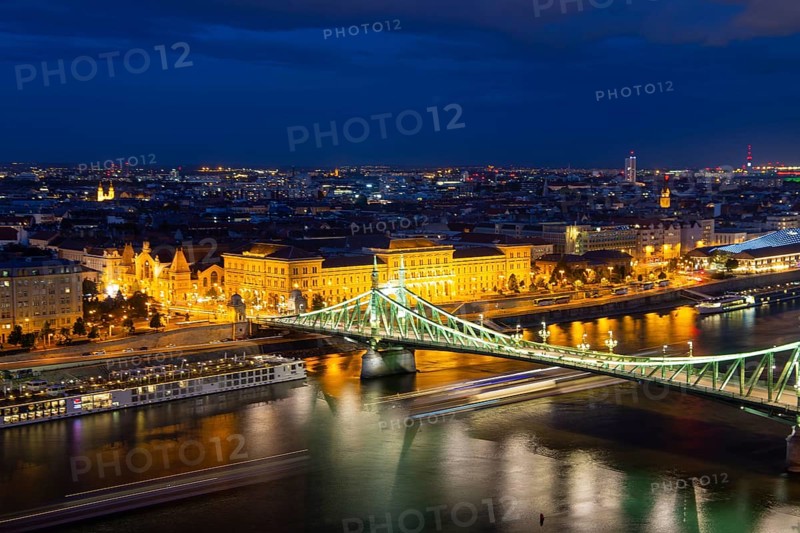 Evening panorama of Budapest with the Danube and the Liberty Bridge in the foreground