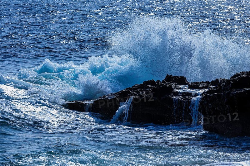 Rugged rocky coastline and foaming spray, on Stecci beach, near Capoliveri, Elba Island, Tuscan Archipelago National Park, Tuscany, Italy, Europe