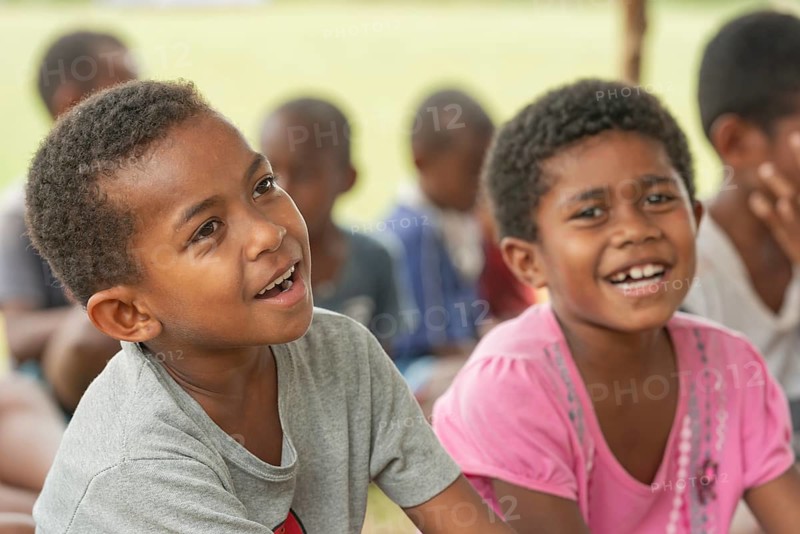 Kids in an outdoor school, Yasawa islands, Fiji, Oceania