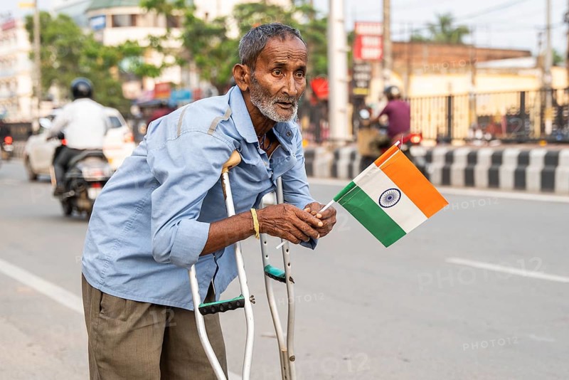 A differently abled person holds a tricolour as he take part in a rally, in soliderity with the Indian armed forces in Guwahati, India on 14 May 2025. A nationwide campaign Tiranga Yatra organized by the Bharatiya Janata Party (BJP) to honor the Indian armed forces' success in Operation Sindoor
