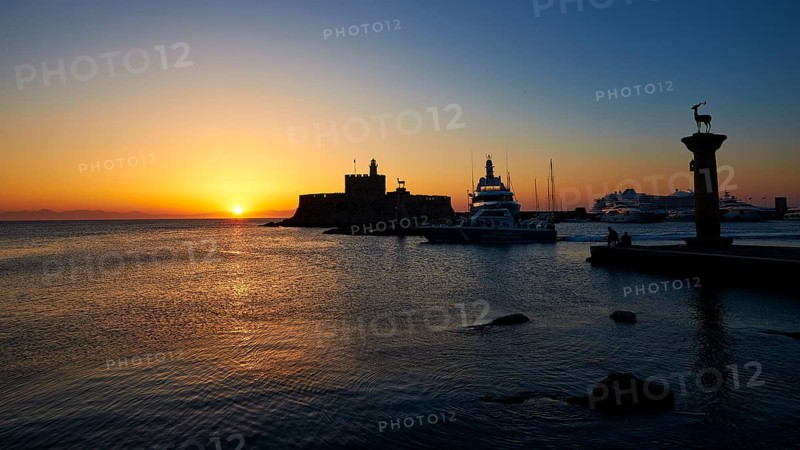 Harbour with boats and fortress, sunrise, dawn, Fort of Saint Nikolaos, Mandraki Harbour, Rhodes Town, Rhodes, Dodecanese, Greek Islands, Greece, Europe