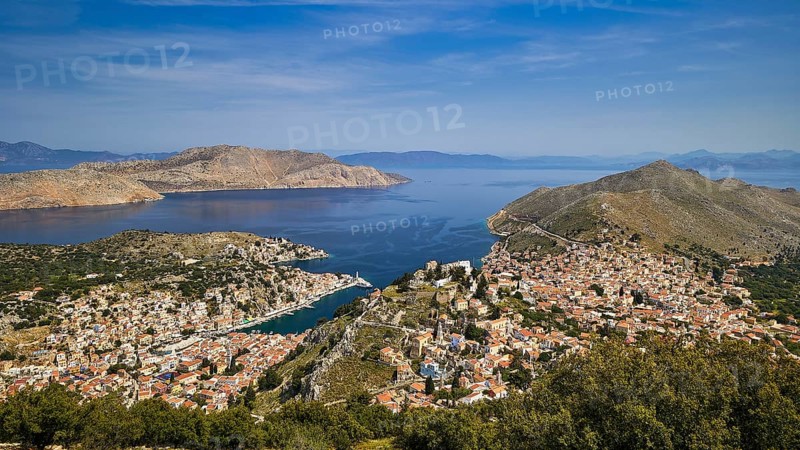 Wide island panorama with deep blue sea and sky, emphasises a peaceful atmosphere, Symi Town, Symi, Dodecanese, Greek Islands, Greece, Europe