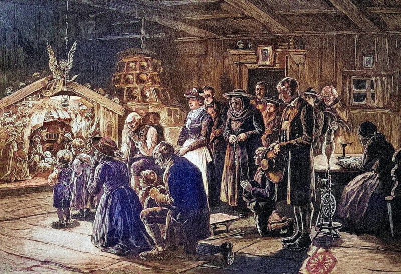 Christmas cot in Tyrol, Austria, coloured wood engraving, reproduction of a model from ca 1888, historical, family gathers in front of a Christmas cot in a festively lit room, Europe