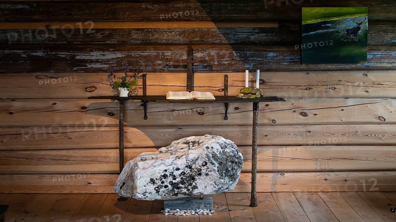 Simple iron-wrought altar and large natural stone, chapel, Fokstugu farm, Fjellstue, pilgrim accommodation, mountain hut, Olavsweg, Olavsleden or Pilgrimsleden, Dovrefjell-Sunndalsfjella National Park, Norway, Europe