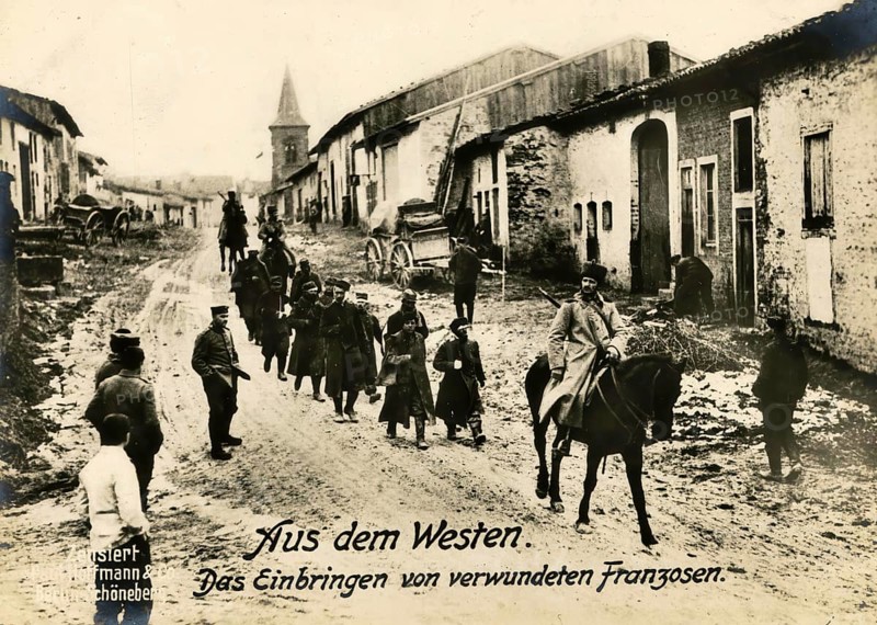 From the West. Bringing in wounded Frenchmen, 1914 - 1918, World War I, reproduction of a war postcard