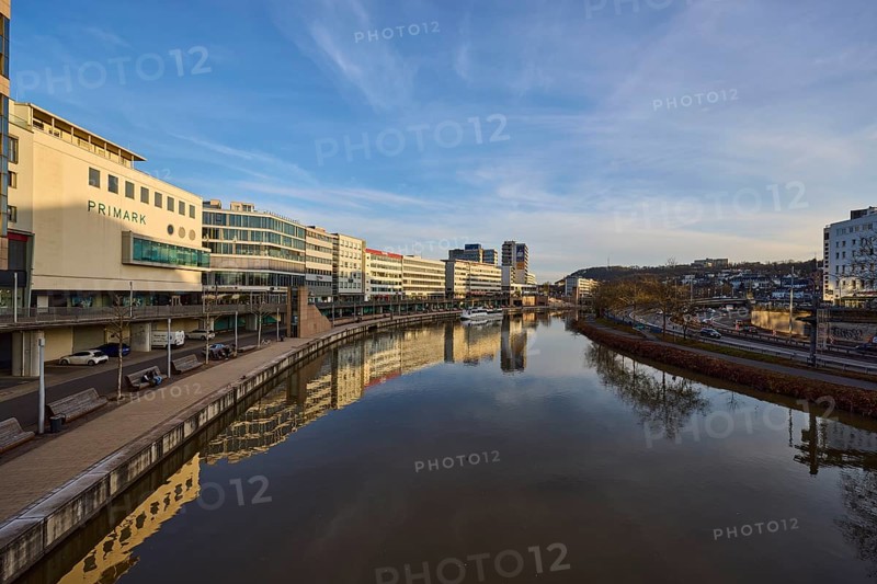 River Saar, modern architecture, trees, reflections on the water surface, fashion shop, Primark, evening light, blue sky, cirrostratus clouds, footbridge, Berlin Promenade, Willi Graf Ufer, Saarbrücken, state capital, Saarbrücken Regional Association, Saarland, Germany, Europe