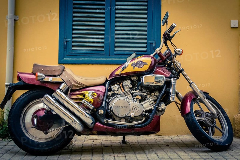 Honda Magna V45 motorcycle parked in front of a building
