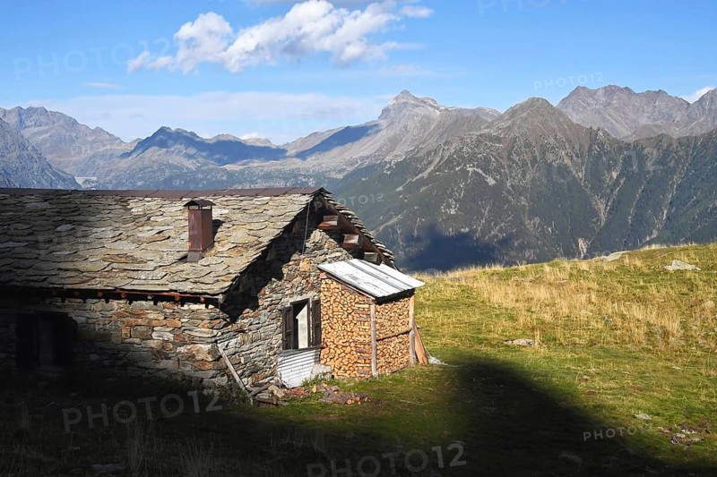 Light and shadows near a hut, Alpe Arcoglio, Valmalenco, Valtellina, Lombardy, Italy, Europe