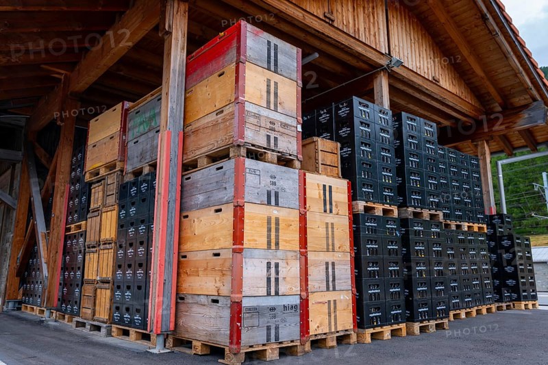 Modern and Old Beer Boxes in Sunny Summer Day in Pontresina, Grisons, Switzerland, Europe