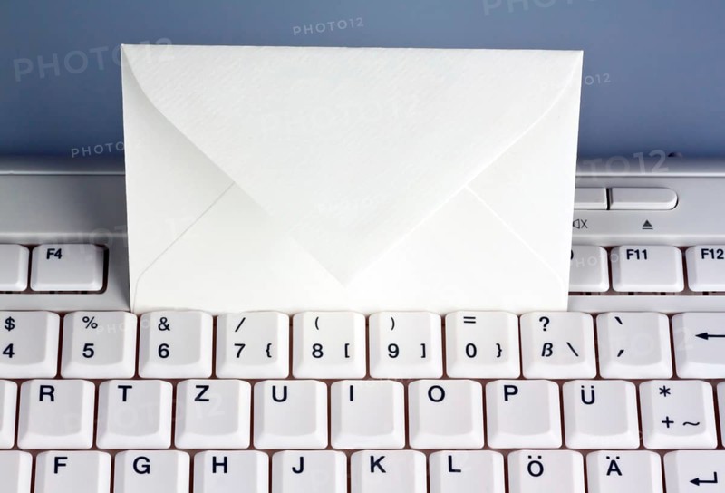 The keyboard of a computer and an envelope. Communication via e-mail, The keyboard of a computer and an envelope. Communication via e-mail. Austria