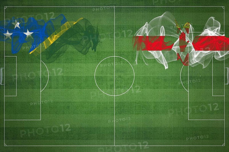 Solomon Islands vs Northern Ireland Soccer Match, national colors, national flags, soccer field, football game, Competition concept, Copy space