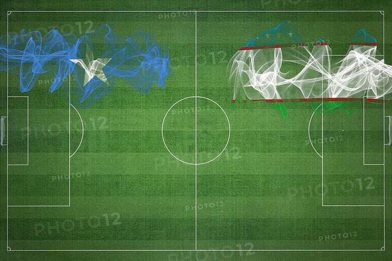 Somalia vs Uzbekistan Soccer Match, national colors, national flags, soccer field, football game, Competition concept, Copy space