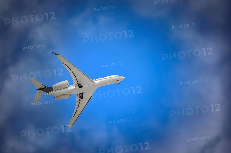 White Plane with Landing Gear in the Sky Varna, Bulgaria, Europe