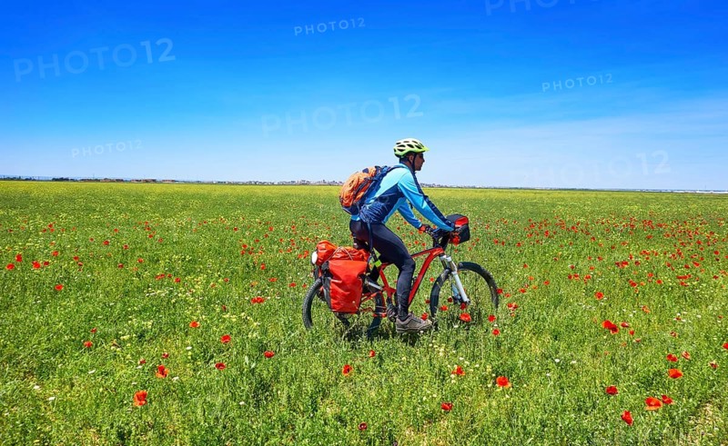 Biker by Camino de Santiago in bicycle at Saint James Way of Levante of Spain