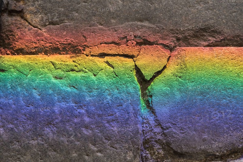Refraction of colours on a stone - background and text space