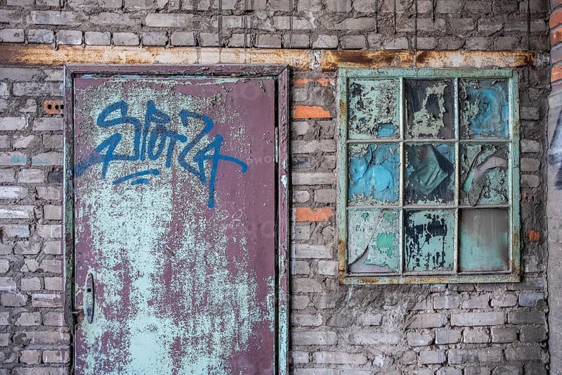 Dilapidated facades on the old shipyard site in Gdansk