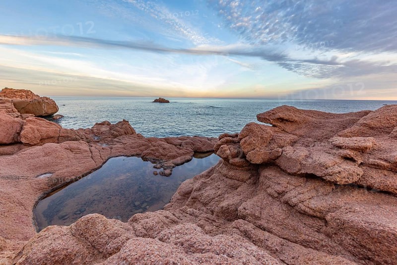 Coastal landscape with bizarre red rocks and sea view, Spiaggia di Cala E'Luas, Ogliastra, Sardinia, Italy, Europe