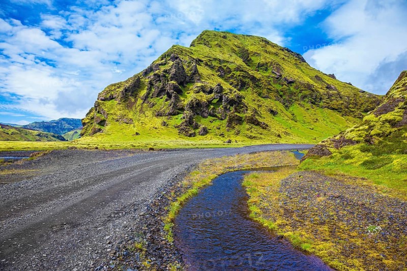 Picturesque basalt hills covered with green grass and moss-polar. At the bottom of the canyon flowing streams lot. Canyon Pakgil in Iceland