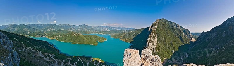 Bovilla reservoir near the capital of Tirana with setting sun in the back