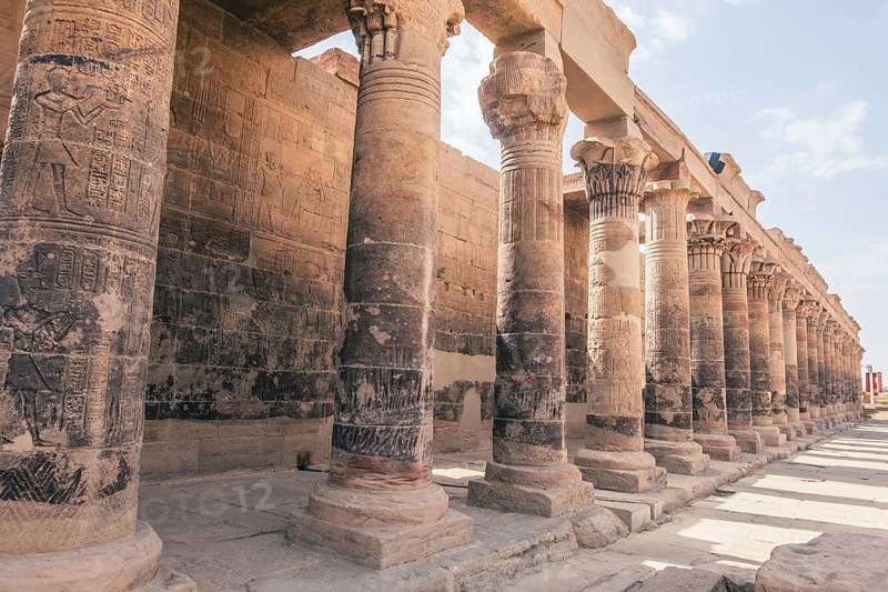 Uncover the mysteries of the Philae Temple in Aswan, a sacred sanctuary that transports you to the heart of Egypt's past. This photograph captures the essence of this historical gem, making it a perfect addition to travel brochures, blogs, or cultural presentations. Experience Egypt's summer allure through captivating images of the Pyramids, Sphinx, and a scenic Nile cruise from Aswan to Luxor. Immerse yourself in ancient history and vibrant landscapes