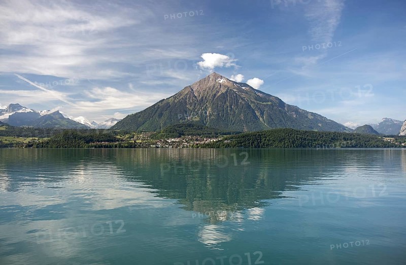 The Niesen is reflected in Lake Thun, Switzerland Thun, Switzerland, Europe