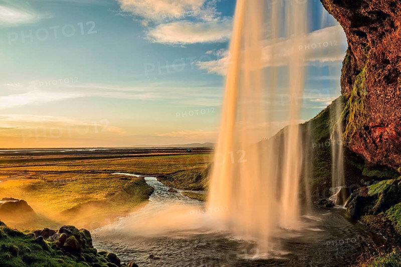 Seljalandsfoss waterfall at sunset in summertime, Iceland, Europe