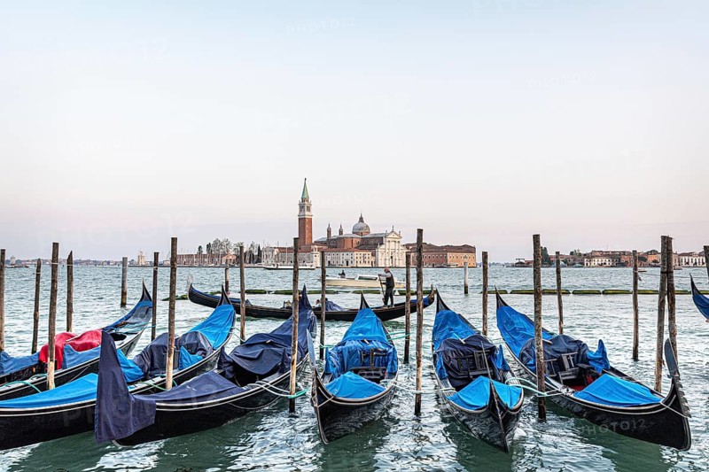 Gondolas tied up for the night, with Church San Giorgio Maggiore, Venice, Italy, Europe