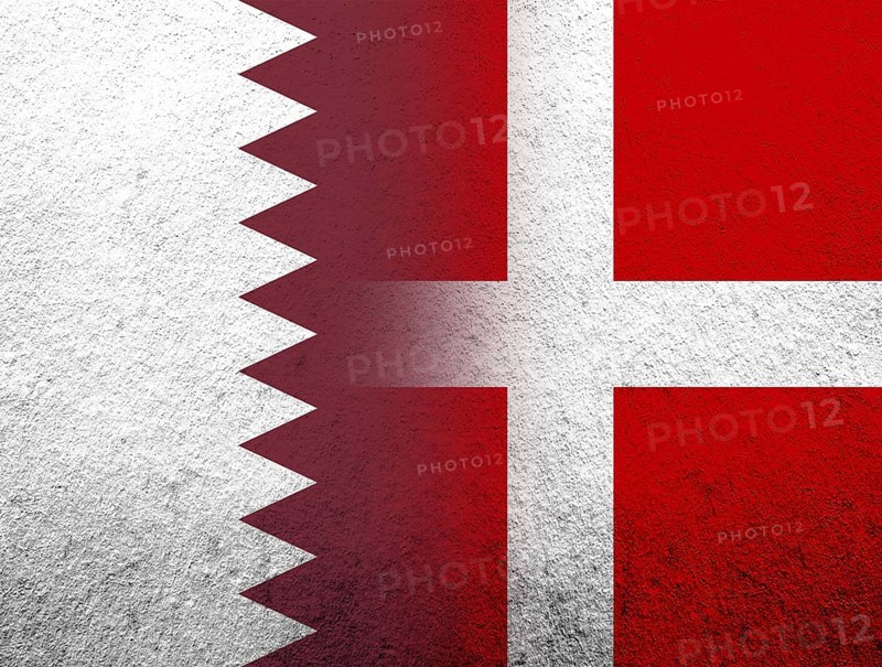 The Kingdom of Denmark National flag with The State of Qatar National flag. Grunge Background