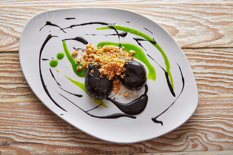 Molecular gastonomy cuttlefish roes with citrus mayonnaise