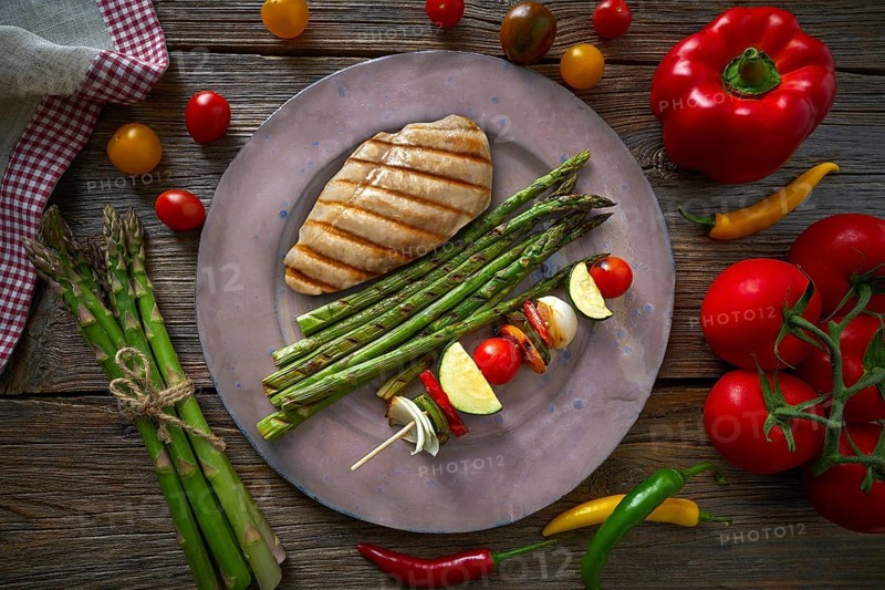 Grilled chicken breast with brochette vegetable with grill asparagus