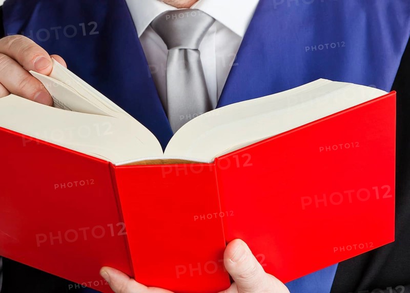 A judge with a law book in court. Jurisdiction and judgments in crime, A judge with a law book in court. Jurisdiction and judgements in crime. Austria