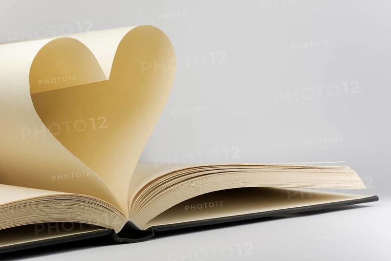 Book with two pages in a heart shape