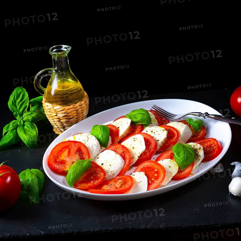 Tomatoes with mozzarella and basil