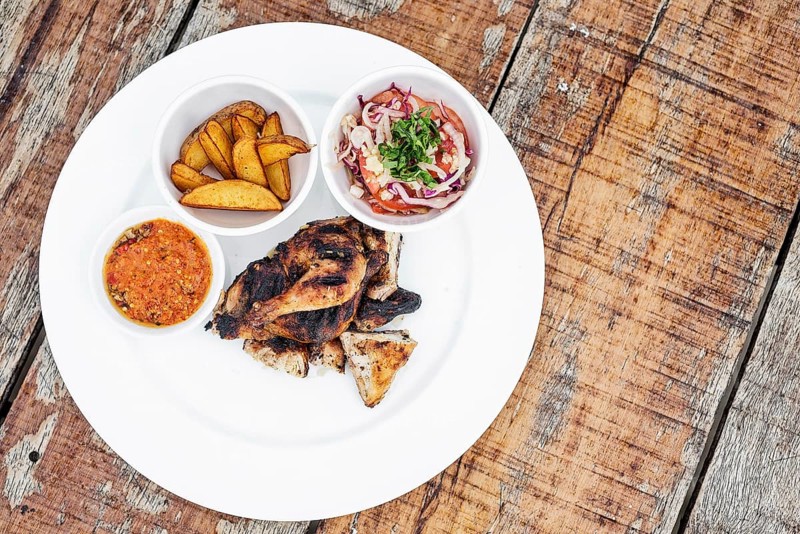 Piri piri portuguese roast chicken with african jindungo spicy sauce meal