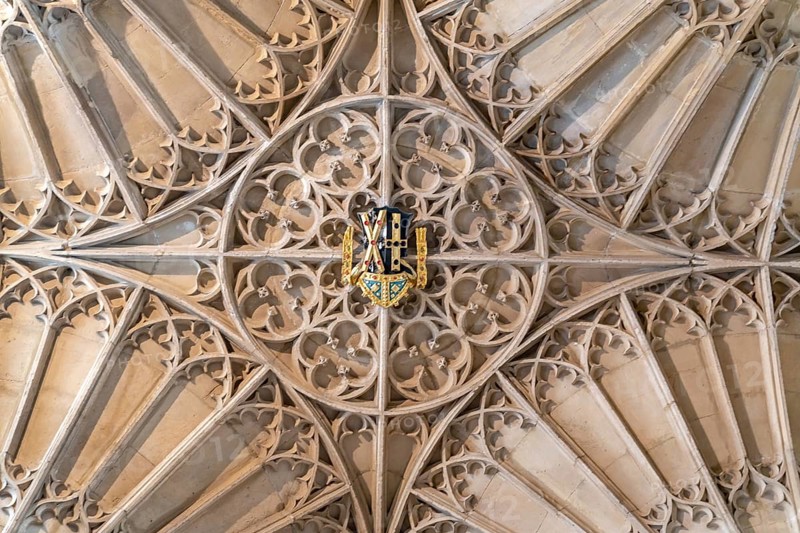 St Davids, United Kingdom, 28 August, 2022: close-up view of the woodwork ceiling and cathedral crest in Saint Davids in Pembrokeshire, Europe