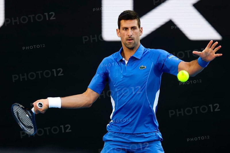 MELBOURNE, AUSTRALIA, JANUARY 11: Novak Djokovic of Serbia plays Stefanos Tsitsipas of Greece during a charity match ahead of the 2024 Australian Open at Melbourne Park on January 11, 2024 in Melbourne, Australia, Oceania