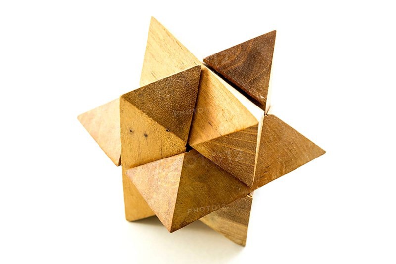 Wooden puzzle isolated on a white background