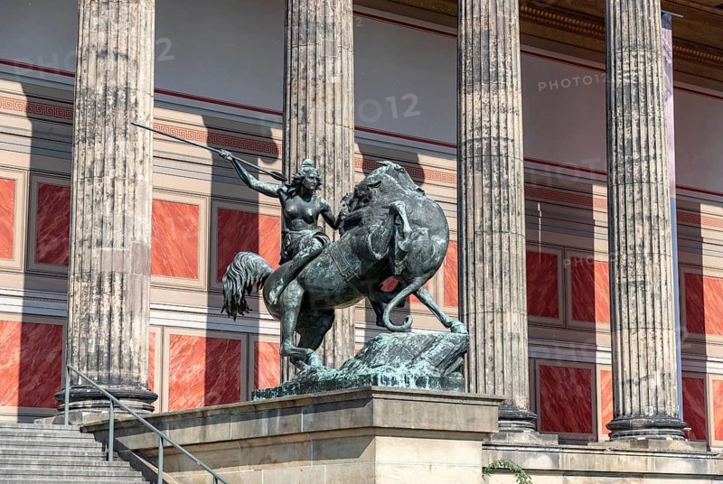 A picture of the Amazon on Horseback statue in front of the Altes Museum. Created in 1841 by August Kiss