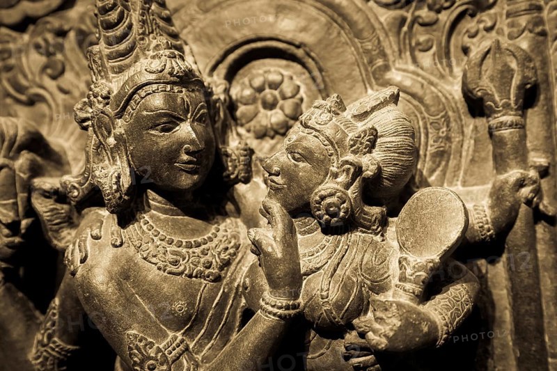 Turin, Italy, April, 2023: Oriental Art Museum. Shiva and Parvati, 10th Century A.D. For Hinduism religion the couple is symbol of love and devotion, traditional practice of sex, tantra and kamasutra, Europe