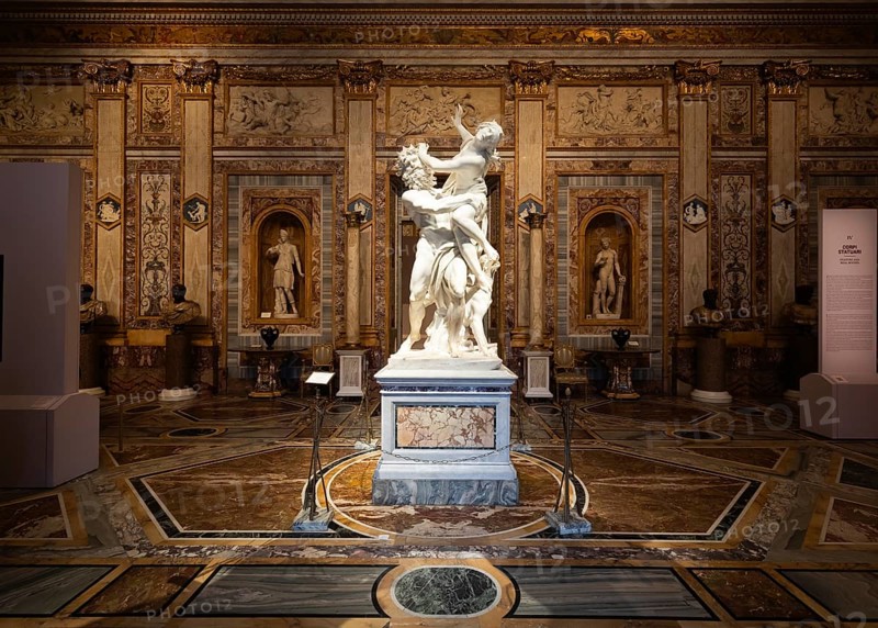 Rome, Italy, 28 December 2023: The Rape of Proserpina by Gian Lorenzo Bernini, 1622. Baroque marble sculpture in Galleria Borghese, Europe