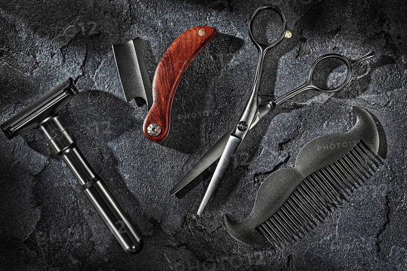 Black Barbers Tools Set On Sone Slate Background