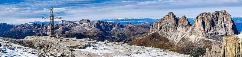 Panoramic photo with summit cross of the Saß Pordoi, in the Dolomites, South Tyrol, Italy, Europe