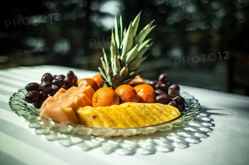 Close up shot taken outside on a white tablecloth. Blurry forest in the background