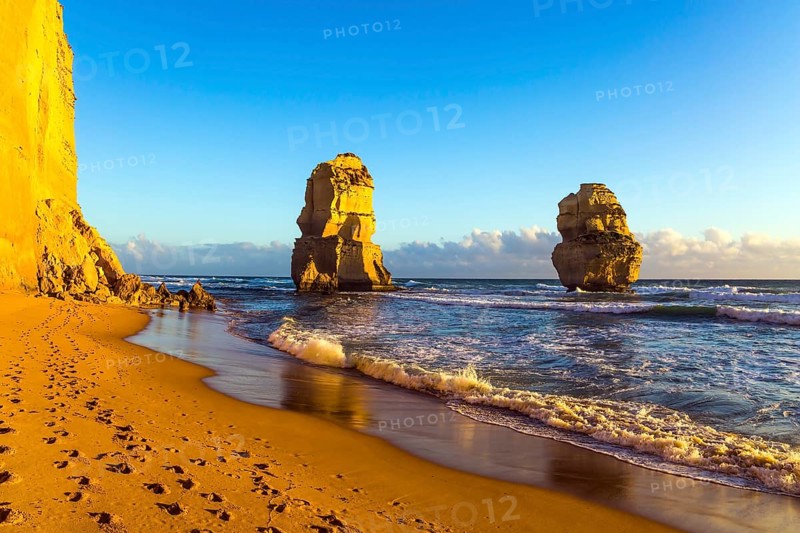 Travel to the edge of the earth. Australian state of Victoria. The Twelve Apostles - a group of limestone rocks in the ocean near the coast. Concept of active and ecological tourism