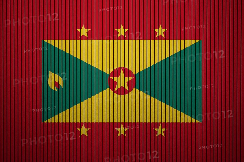 Grenada Flag painted on the cracked grunge concrete wall