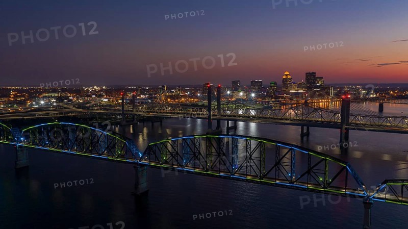 Multi Colors of light hit the Big Four bridge before sunrise around Lousville Kentucky