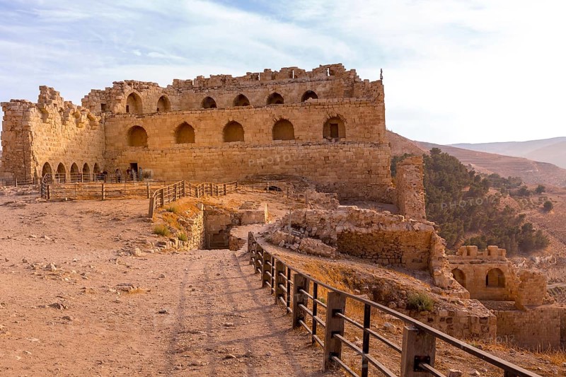 Al Karak, Jordan, November 4, 2022: Medieval Crusaders Castle in the center of the city and tourists, Asia