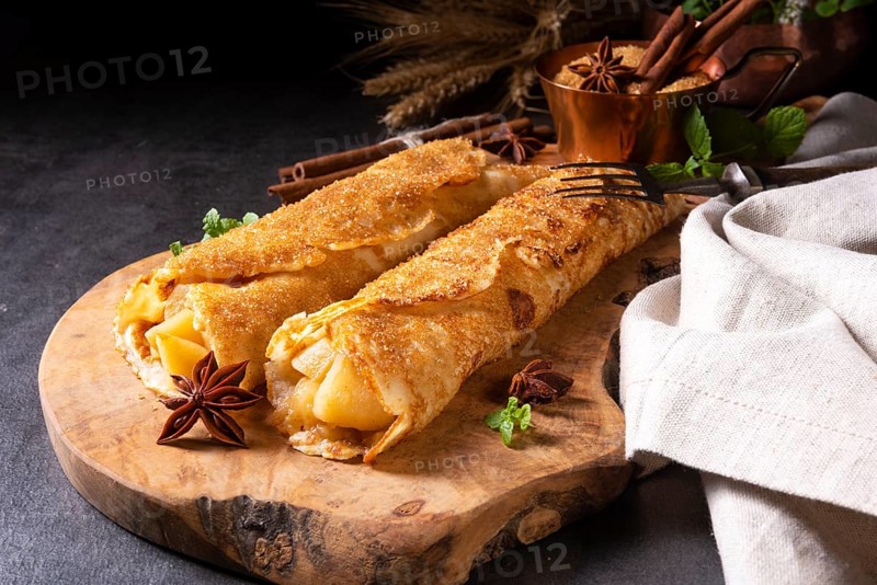 Tasty autumnal omas pancakes with apple and cinnamon