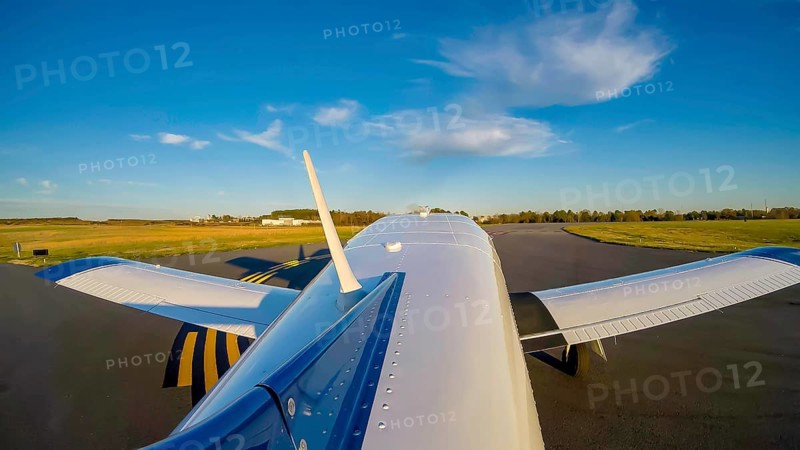 A small general aviation aircraft, its pre-takeoff checklist complete, taxis carefully to the active runway. Following precise instructions from the control tower, it prepares for takeoff, Concord, United States of America